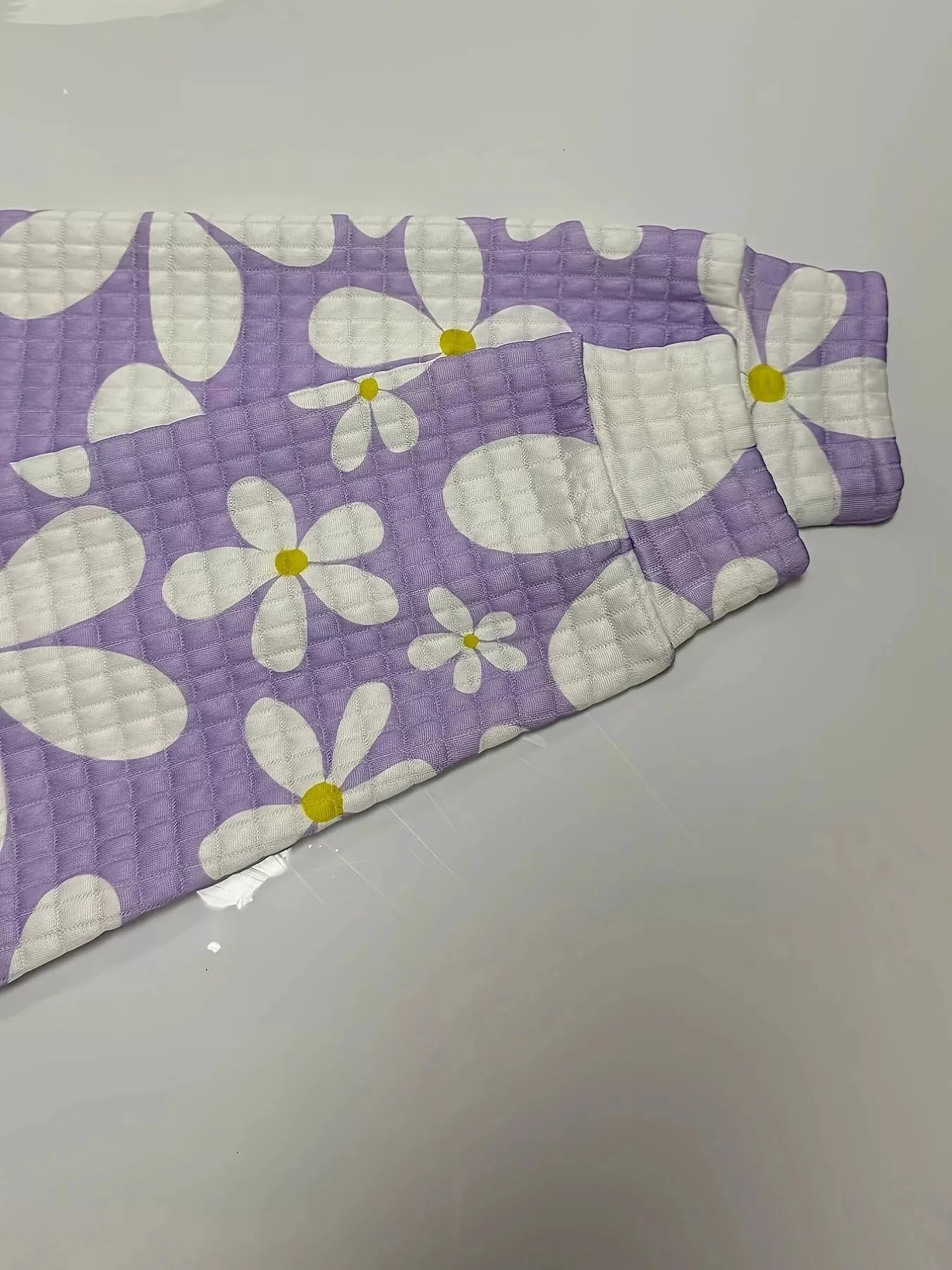 Floral Print Textured Drawstring Hoodie by Trendsi