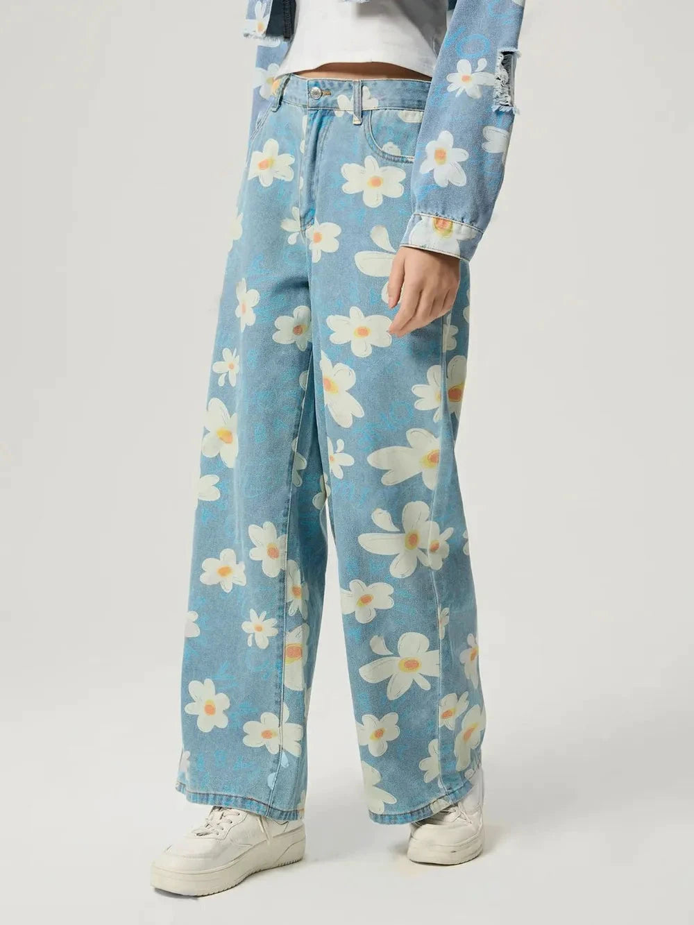 Pocketed Floral Wide Leg Jeans by Trendsi