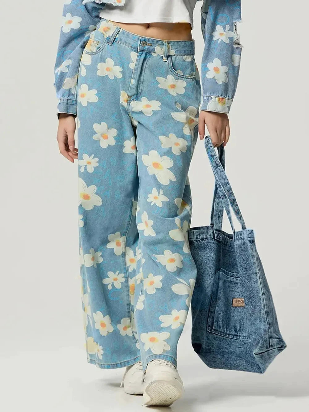 Pocketed Floral Wide Leg Jeans by Trendsi