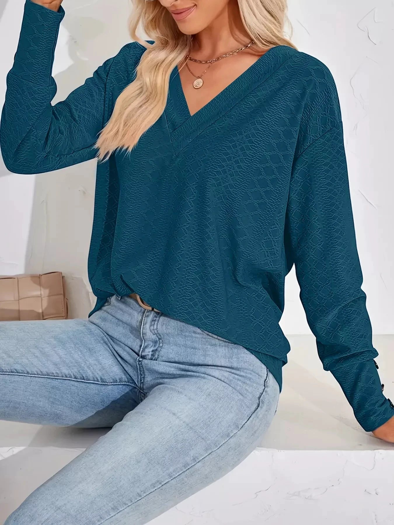 Plus Size V-Neck Textured Long Sleeve T-Shirt by Trendsi