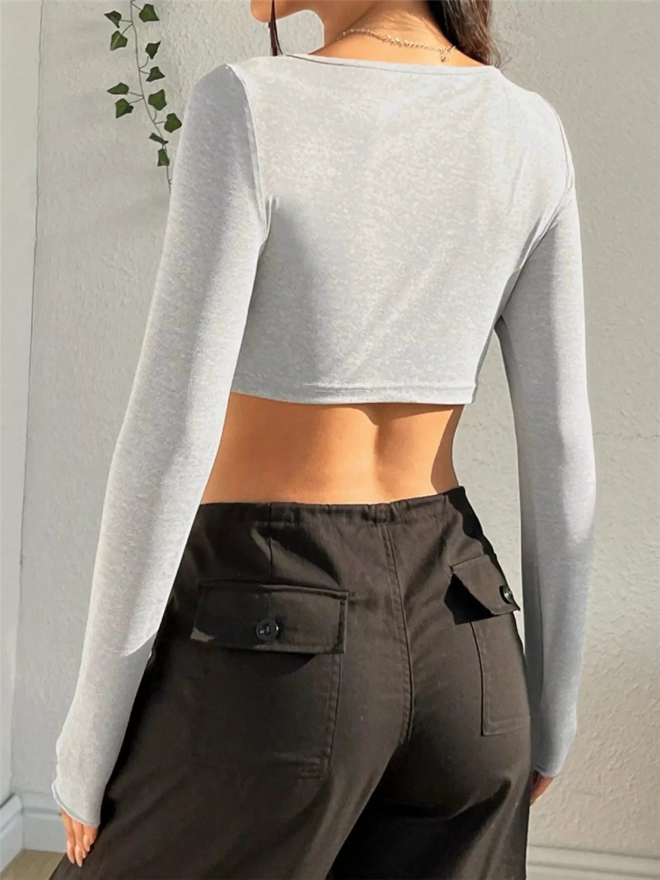 Twisted Front Long Sleeve T-Shirt by Trendsi