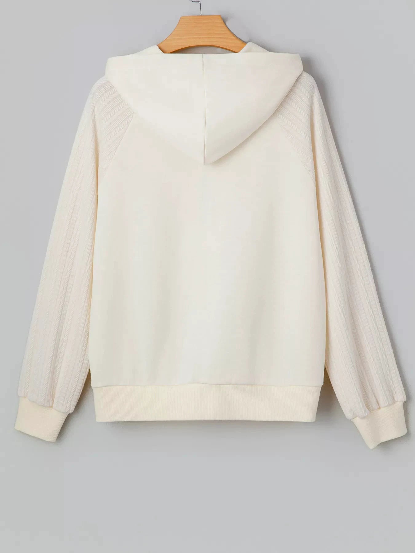 Solid Color Textured Sleeve Patchwork Half Zip Hoodie by Trendsi