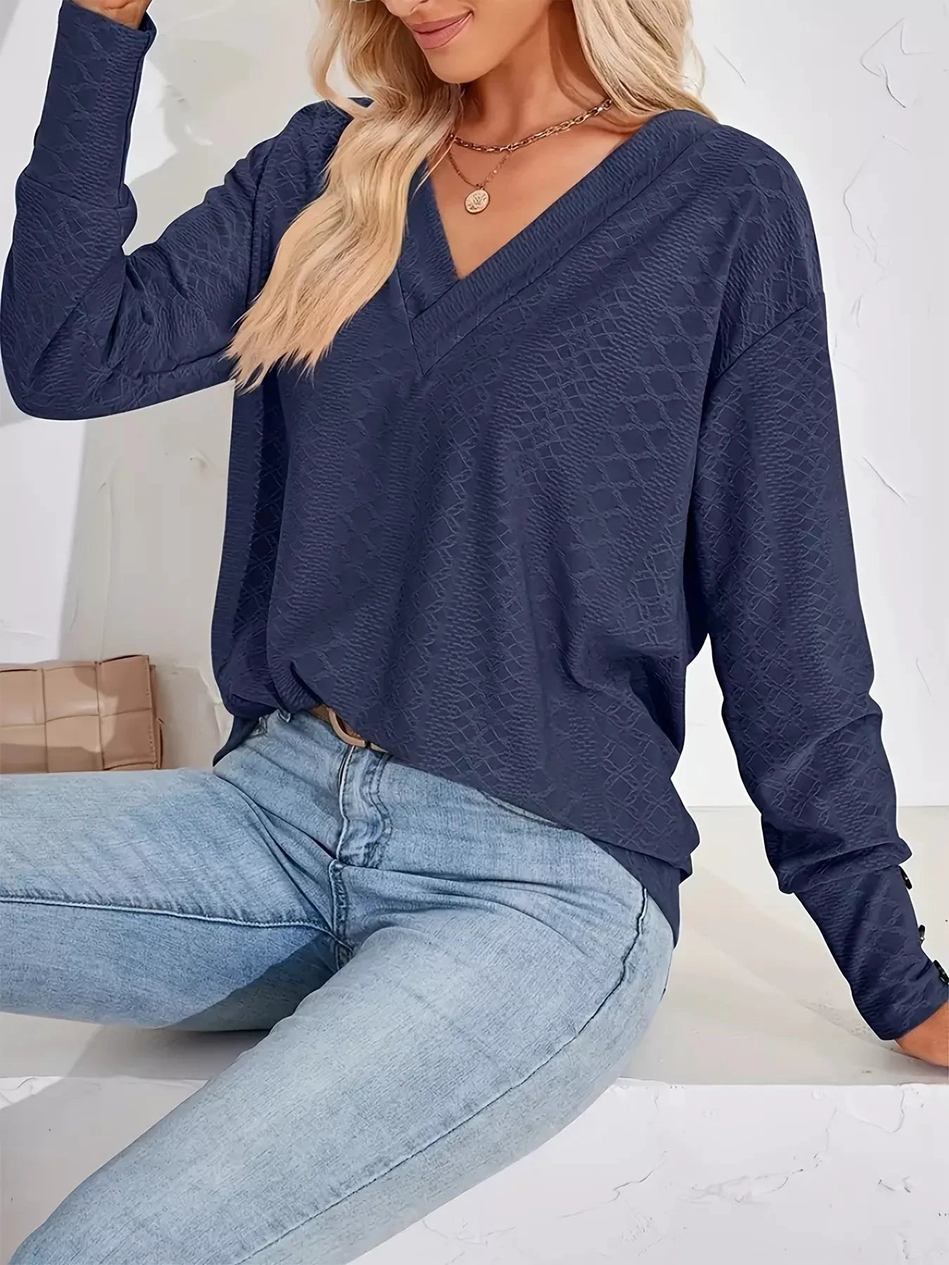 Plus Size V-Neck Textured Long Sleeve T-Shirt by Trendsi