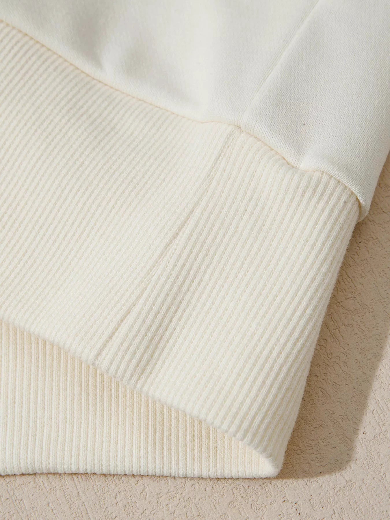 Solid Color Textured Sleeve Patchwork Half Zip Hoodie by Trendsi