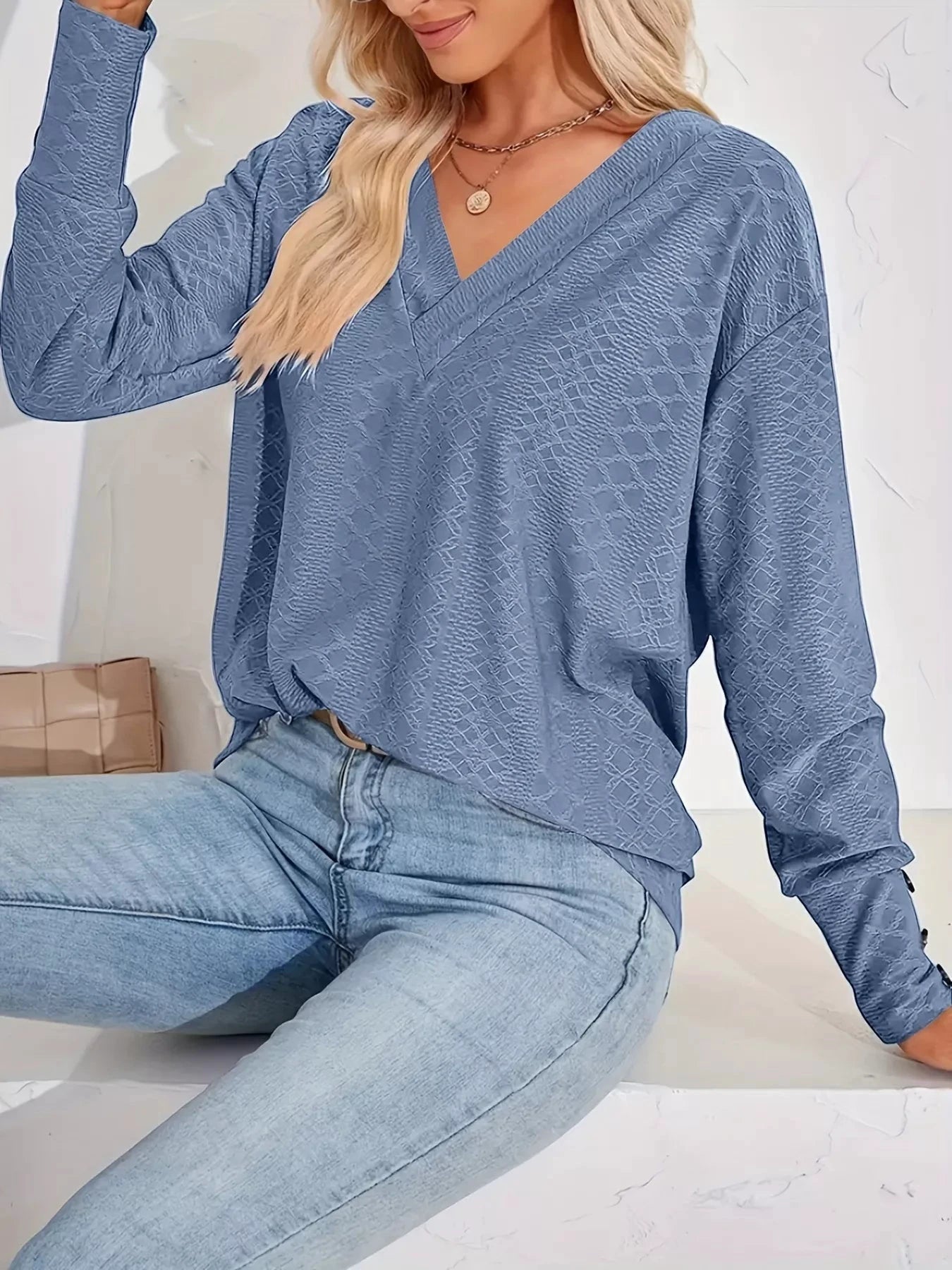 Plus Size V-Neck Textured Long Sleeve T-Shirt by Trendsi