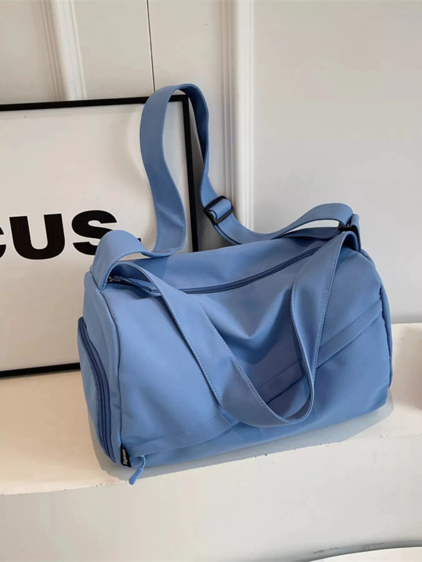 Adjustable Strap Solid Color Travel Bag by Trendsi