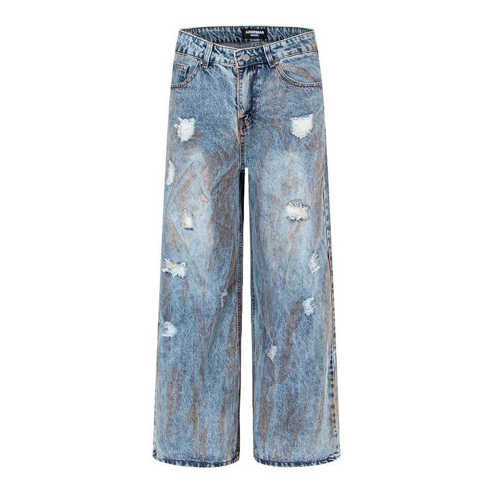 Pantalon en denim délavé, coupe droite oversize.