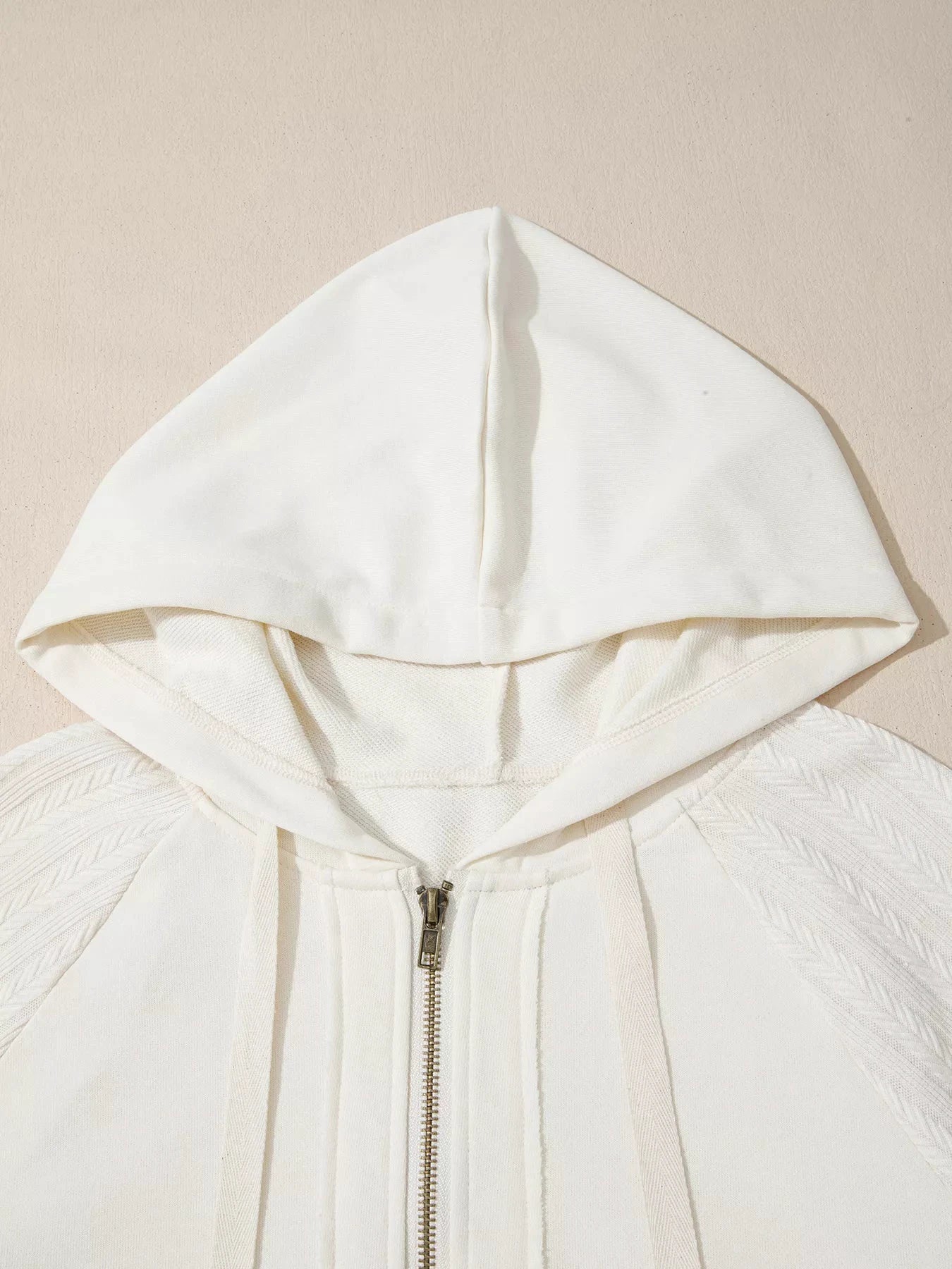 Solid Color Textured Sleeve Patchwork Half Zip Hoodie by Trendsi