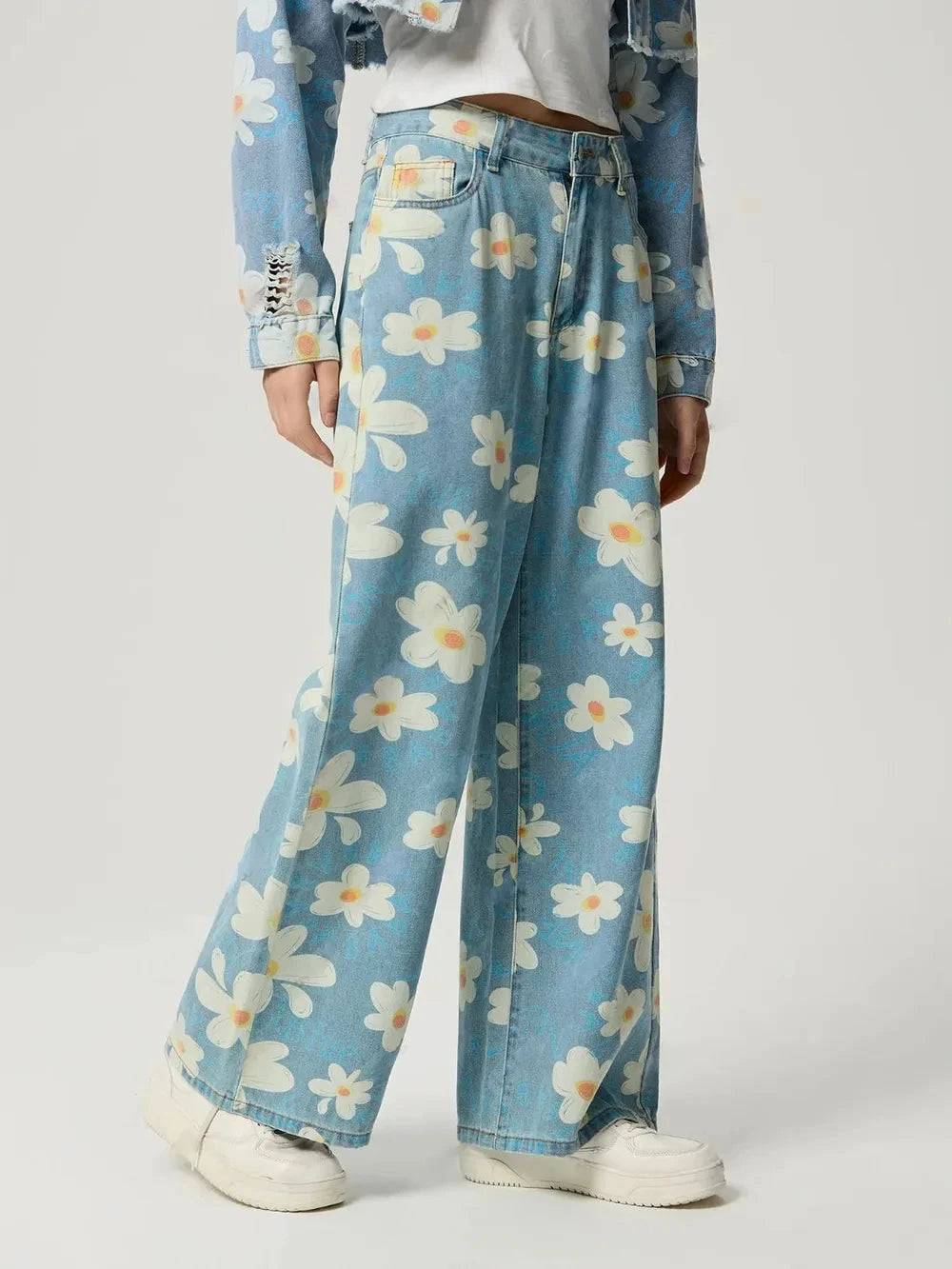 Pocketed Floral Wide Leg Jeans by Trendsi