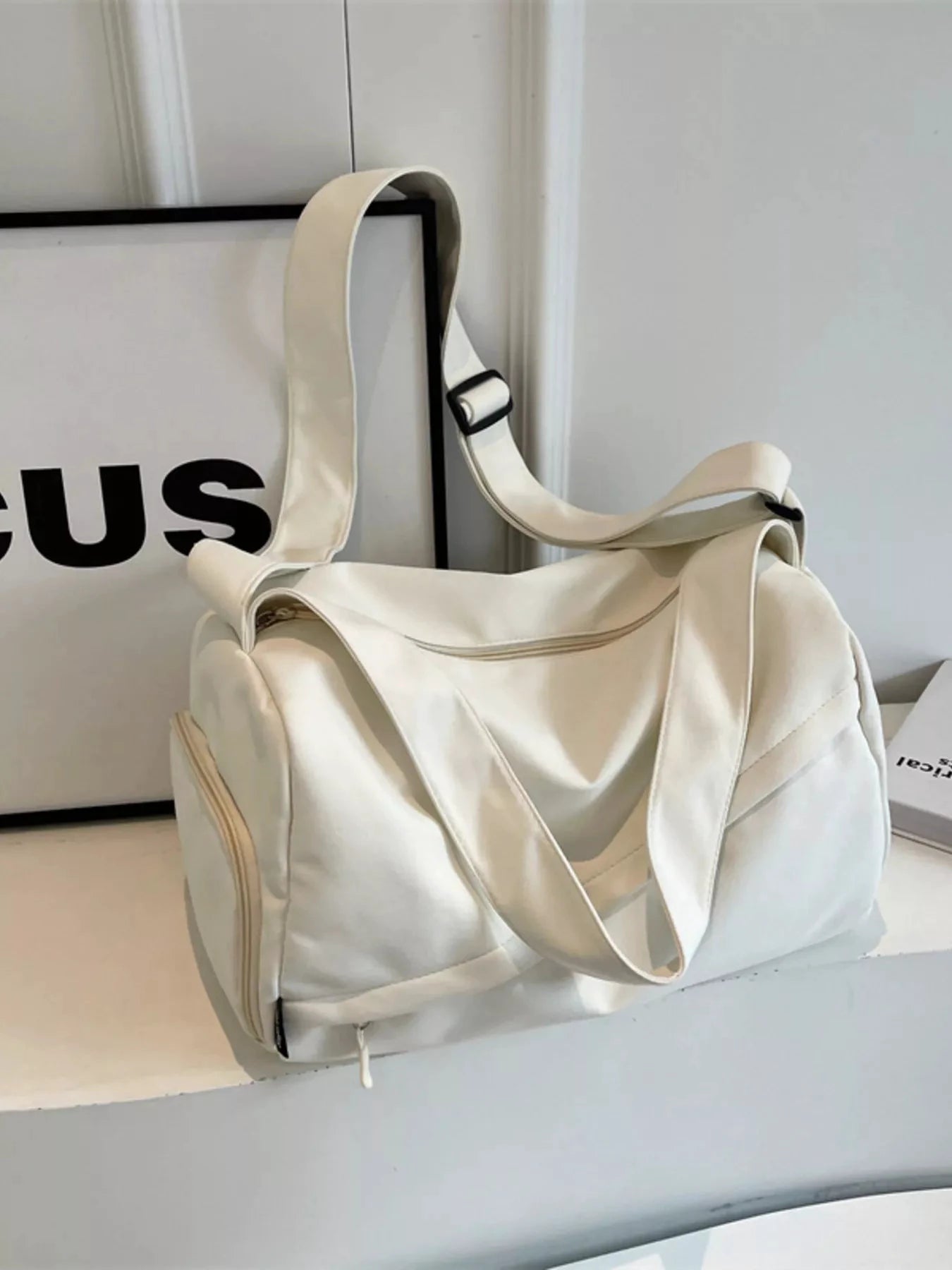 Adjustable Strap Solid Color Travel Bag by Trendsi