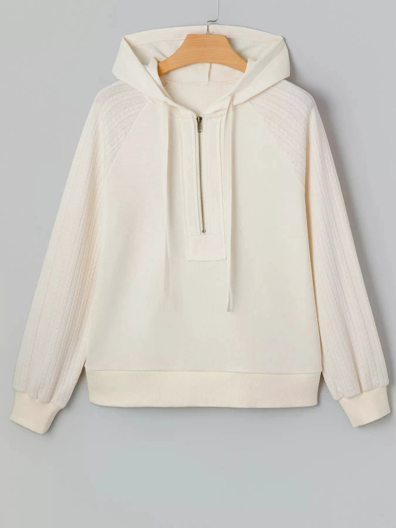 Solid Color Textured Sleeve Patchwork Half Zip Hoodie by Trendsi