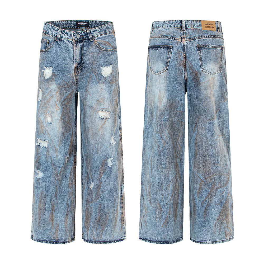 Pantalon en denim délavé, coupe droite oversize.