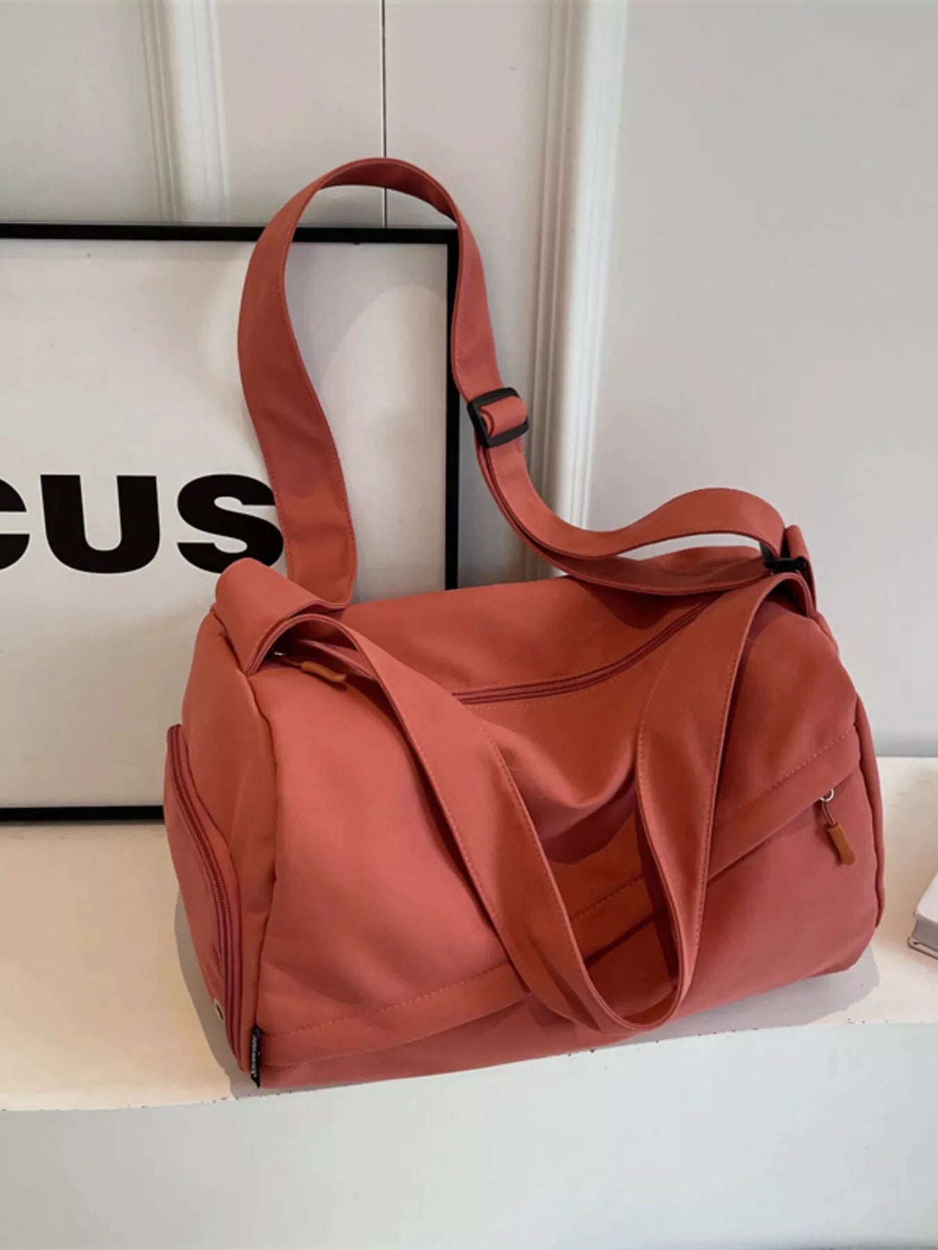 Adjustable Strap Solid Color Travel Bag by Trendsi