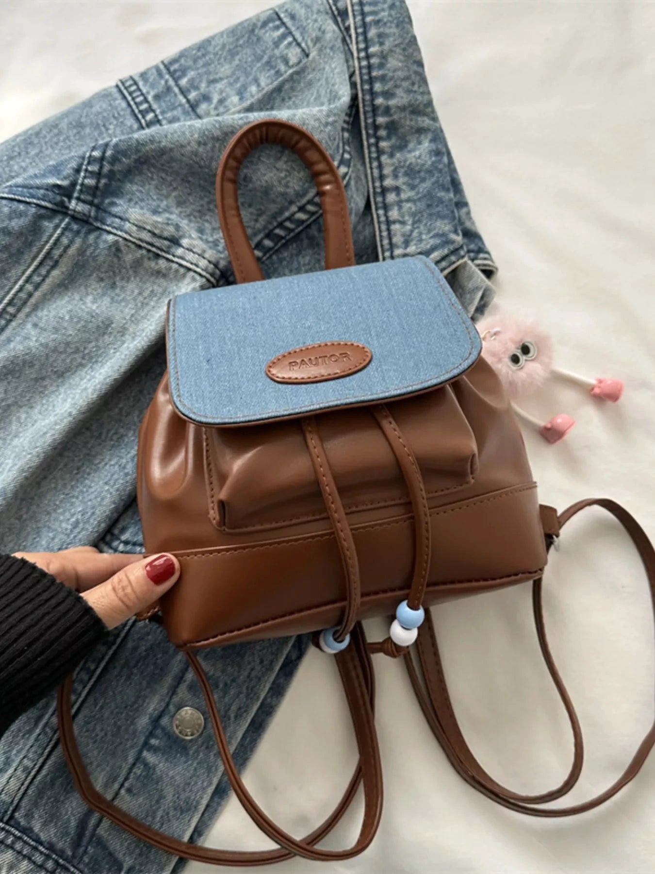 Mini Leather Drawstring Backpack Bag by Trendsi