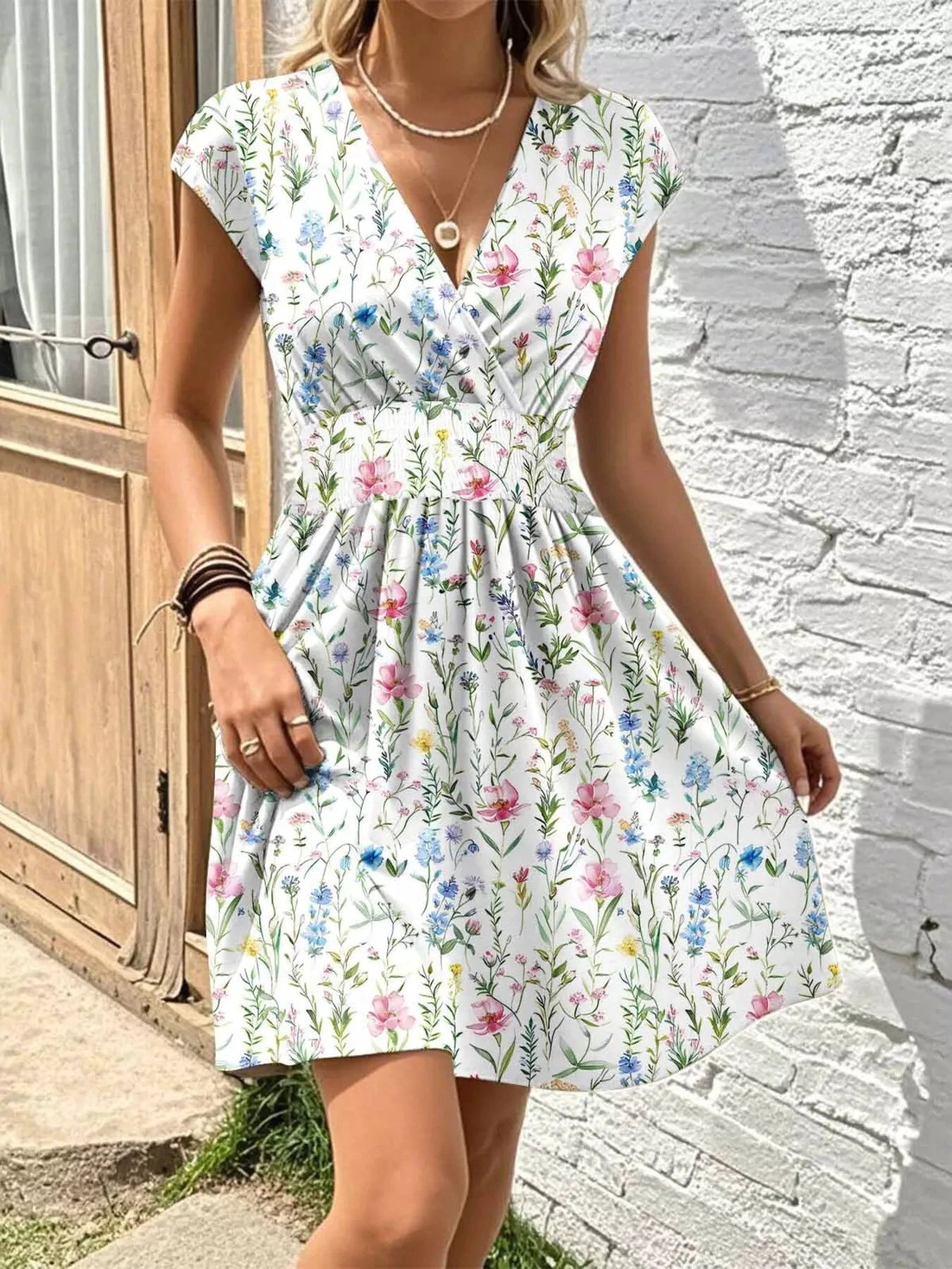 Floral Print Surplice Mini Dress by Trendsi