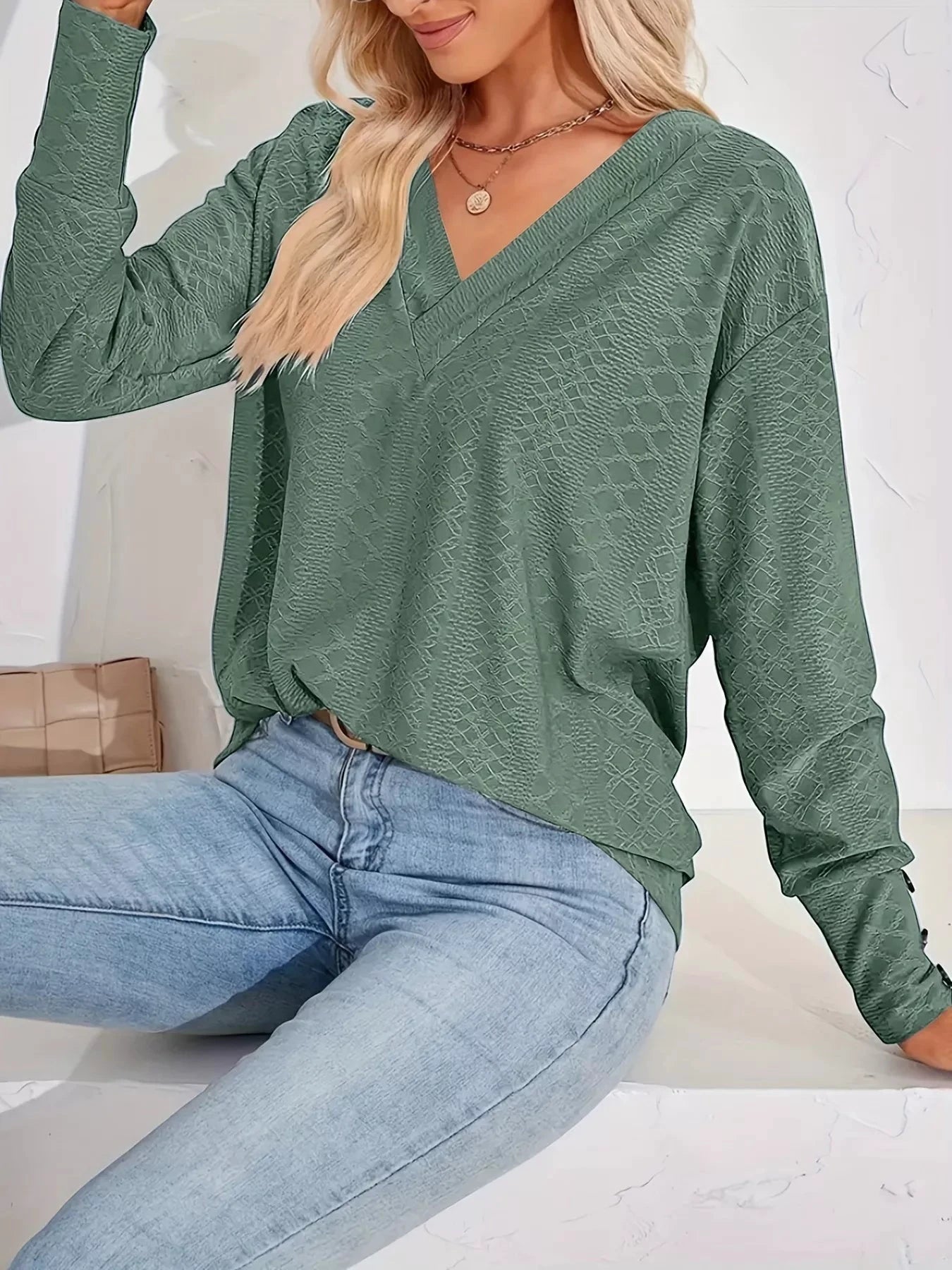 Plus Size V-Neck Textured Long Sleeve T-Shirt by Trendsi