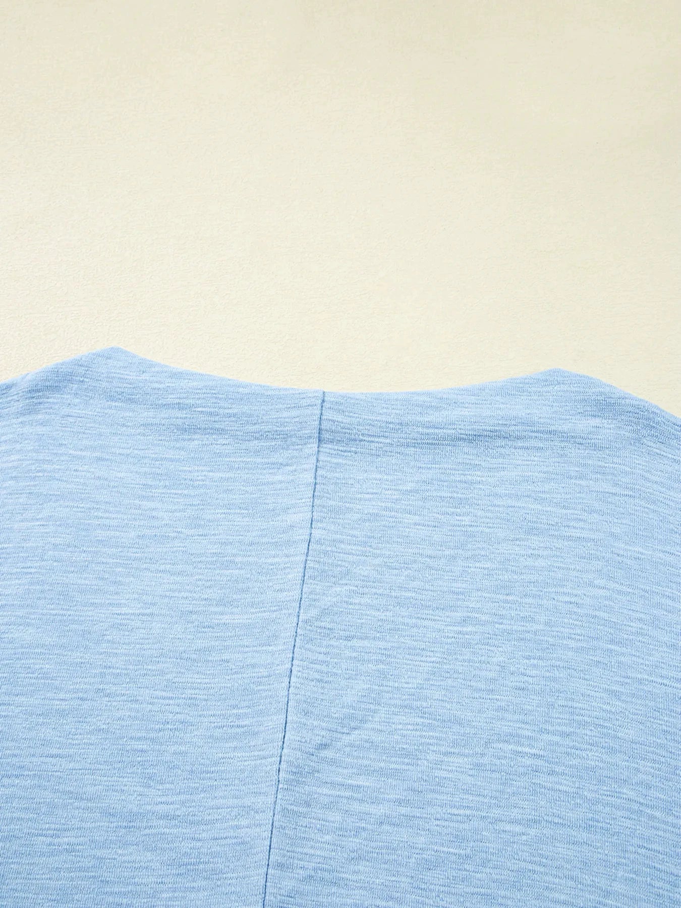 Solid Color Batwing Long Sleeve Top by Trendsi