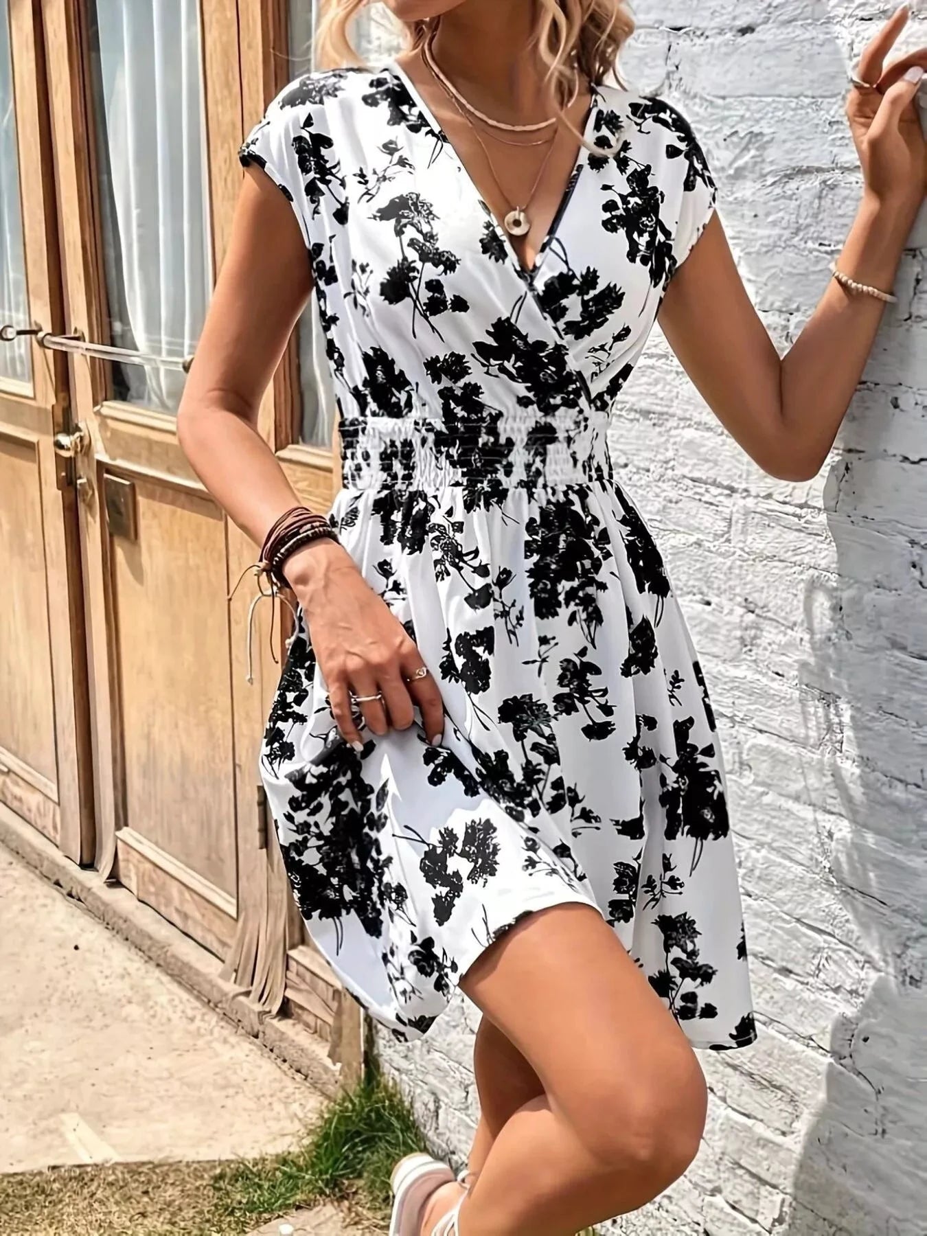 Floral Print Surplice Mini Dress by Trendsi